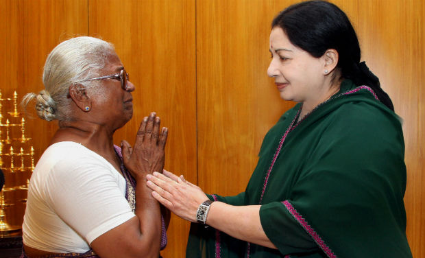 Arputhammal, mother of Perarivalan, a death row convict in the Rajiv Gandhi assassination case, with Tamil Nadu CM Jayalalithaa, after state government's decision to release all the seven convicts in the case, in Chennai on Wednesday. However, SC Arputhammal, mother of Perarivalan, a death row convict in the Rajiv Gandhi assassination case, with Tamil Nadu CM Jayalalithaa, after state government's decision to release all the seven convicts in the case, in Chennai on Wednesday. However, SC